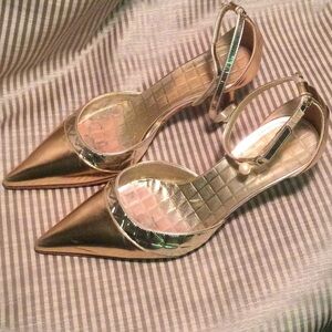 Gold Chanel leather kitten heels